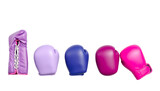 Boxing gloves in various colors arranged in a row, isolated view