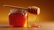 © STK - Golden honey flowing from a wooden honey dipper into a glass jar on a brown background.