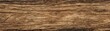 © bismillahlancar - Close-up of a textured, weathered wooden surface with horizontal wood grain