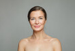 © millaf (Nemchinova) - Gorgeous mid aged mature woman looking at camera and smiling. Healthy face skin care beauty