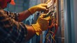 © Almaz - 'Electrician Installing Smart Home Wiring Inside Wall'