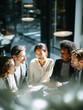 © Designer's Stockroom - Business men and women wearing suit or formal outfit, discussing at their meeting with co-worker and client at   modern office in urban building.