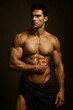 © Models and Assets - Shirtless Muscular Male Model with Defined Abs Strong Athletic Body Posing Like Classical Statue Fitness Physique Strength Health Lifestyle Studio Lighting