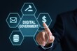 © Media Srock - A hand interacts with a glowing digital interface showcasing elements of digital government.