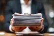 © Masque - Organizing and searching through office files for important information.