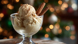 Helado de canela, cinnamon-flavored ice dessert served in a glass cup, with a softly blurred Christmas tree softly glowing behind. Sweet and refreshing.