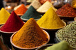 © Vitali - A close-up of colorful Iranian spices displayed in mounds at a market stall, creating a vibrant, aromatic visual.