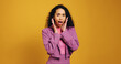 © peopleimages.com - Portrait, shocked and woman in studio, wow and sales announcement on yellow background. Space, surprise and person with facial expression, omg and discount deal with news, reaction and information