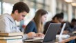 © N7 - Blurry students studying with laptops — symbolizing focus on digital knowledge
