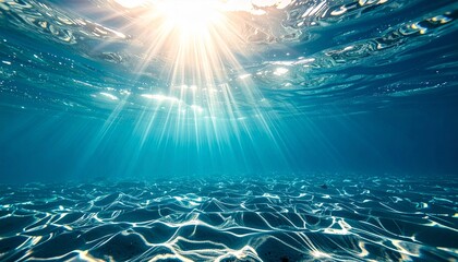 Wall Mural - Rays of light pierce through the clear blue water in an underwater tropical ocean scene with colorful coral reefs and fish