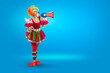 © TSViPhoto - Funny female clown shouting with loudspeaker. Woman entertainer as colorful Joker, suit and wig, clown whiteface makeup. Trickster, jester, pantomime, mime, and a professional actor at events