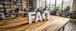 © Thai - Frequently Asked Questions abbreviation shown as decorative letters on office desk with clean minimal design, highlighting customer service, business help, and professional workplace concept