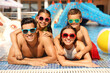 © New Africa - Happy family in swimming pool. Summer vacation