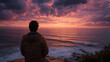 © Kale Galaxy - A man admiring a breathtaking sunset over the ocean (3)