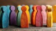 © Adi - Diverse Wooden Human Shapes Arranged as Concept of Society and Culture