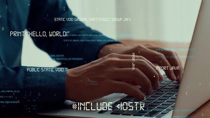 Computer programmer uses capable laptop computer to develop programming code of new software . Computer specialist working on future coding application for software programming development .