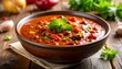 © Isan - Hearty chili in a rustic bowl