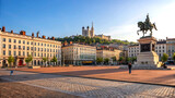 Sunny plaza view of place bellecour in lyon with grand architecture