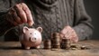 © Dao - Saving money investment for future. old man hand putting money coins in a piggy bank.investment, money, annuity insurance, saving for retirement and pension fund concept.Individual retirement account.