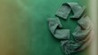 © Saqlain - Recycle symbol made of burlap fabric on green background for environmental awareness and sustainability