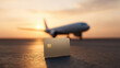 © Nakarin - Credit card standing on runway surface with airplane in background during sunset, symbolizing travel and finance connection