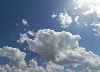 Wall Mural - partly cloudy cumulus clouds photo