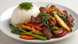 A vibrant plate of stir-fried beef and vegetables served with fluffy white rice, garnished with fresh herbs.