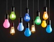 © Ce - Colorful light bulbs hanging from dark background