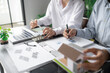 © Charlie's - Solar panels green energy Business man working green eco friendly office business creative idea Planing Bio economy for business eco friendly professional Engineer sustainable electricity.
