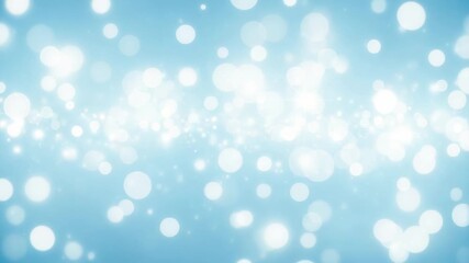 A soft and dreamy blue background filled with sparkling bokeh lights and glittering particles, creating a magical and festive atmosphere