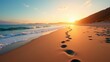 © PicksZone - Footsteps leading across a sandy beach toward a glowing sunrise, captured in soft warm light. Evokes feelings of a journey, progress, and new beginnings.