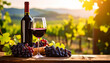 © Tomo - A wine glass filled with red wine, a wine bottle, and grapes placed in a beautiful vineyard at sunset