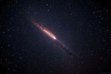 Wall Mural - glowing meteor streaks across the nighttime sky filled with stars