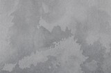 Graphite pencil sketch on a textured gray canvas surface, close-up detail.