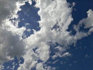 Wall Mural - sky covered with partly cloudy cumulus clouds.