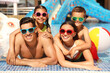 © New Africa - Happy family in swimming pool. Summer vacation