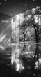 © brewok - Interior view of a modern building, showcasing large windows reflecting a tranquil outdoor scene.  Sunlight streams in, creating dramatic light patterns on the polished floor