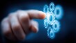 © MarkelovaVision - A finger interacts with glowing digital gears, symbolizing innovation and technology.