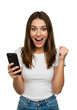 © Elitemedia - Excited Young Woman with Mobile Phone Celebrates a Victory Isolated on a Transparent Background PNG