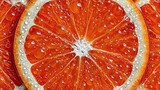 Vibrant Red Orange Slice with Refreshing Water Drops, Close-up Citrus Texture