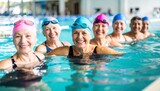 Happy Seniors Enjoying Water Aerobics Class in Swimming Pool.