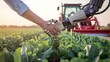 © Mia - A handshake between a human and an AI robot hand in a green field, showcasing collaboration, innovation, and the integration of technology in modern agriculture