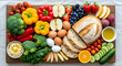 © Itshamza - Vibrant assortment of fresh, healthy foods including fruits, vegetables, eggs, bread, and oil, beautifully arranged for a wholesome meal.