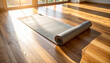 © bazou - Yoga Mat Unrolled on Hardwood Floor in Sunny Room