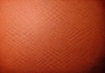 Detailed texture of a basketball surface ideal for sports backgrounds and graphic design projects