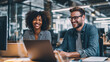 © benjamin - Two professionals share a light moment in a modern office environment, their smiles radiating genuine camaraderie as they collaborate on a project. capturing the essence of teamwork.