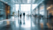 © Weiguo - Long exposure shot of crowd of business people walking in bright office lobby fast moving with blurry,