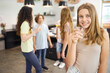 © Robert Kneschke - Smiling teenagers enjoying drinks together in a school cafeteria setting