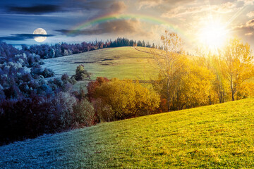 Wall Mural - mountain landscape with forest on autumn equinox. day and night time change concept. beautiful countryside in the highland  with sun and moon at twilight. nature background for outdoor adventure