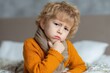 © Oleksandr - Kid Sore Throat. Sick Little Boy Coughing in Bed. Close-Up Portrait of Ill Child at Home